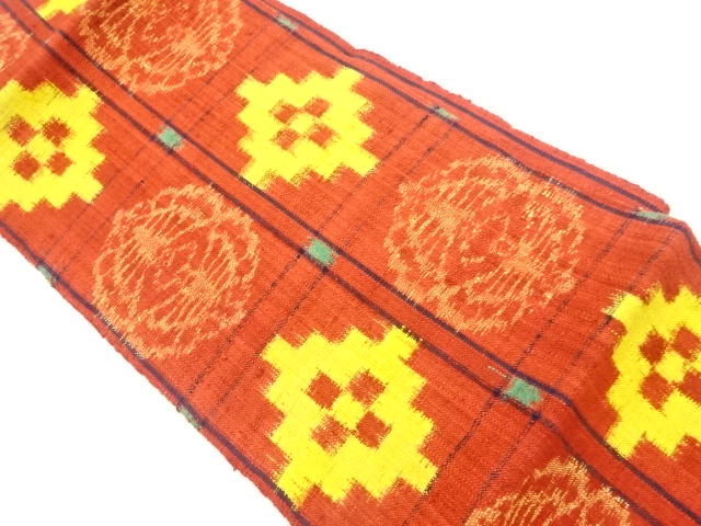 手織り真綿紬格子に抽象模様織出し名古屋帯